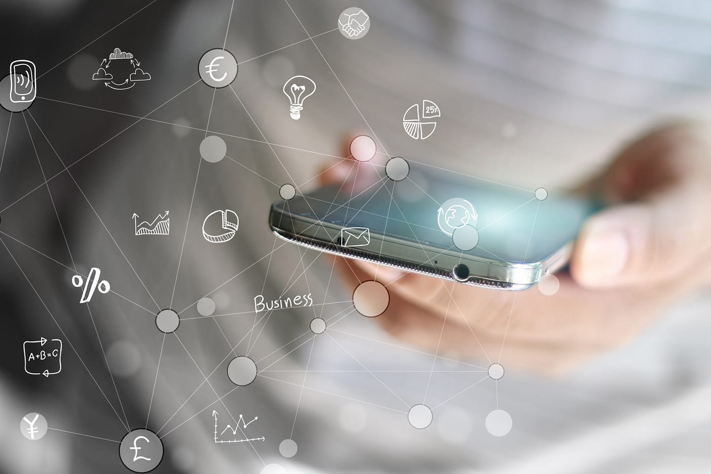 A hand holding a smartphone surrounded by a network of business and finance icons